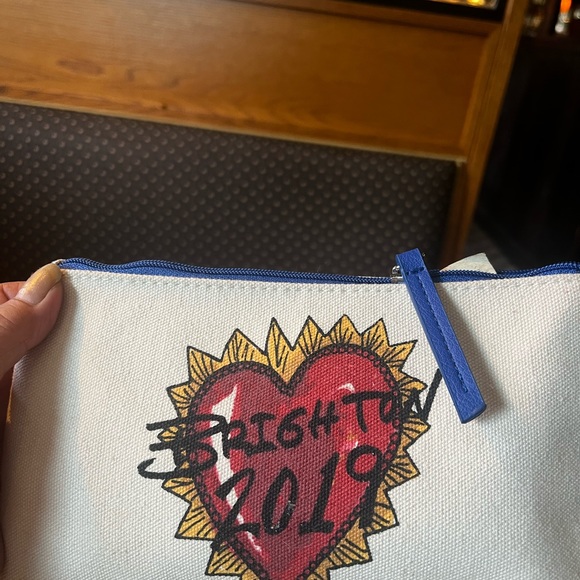 Brighton make up case painted to resemble the Ed Hardy...